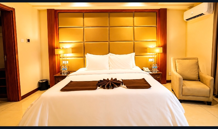 Deluxe suite with gold headboard